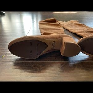 Over the knee suede boots.